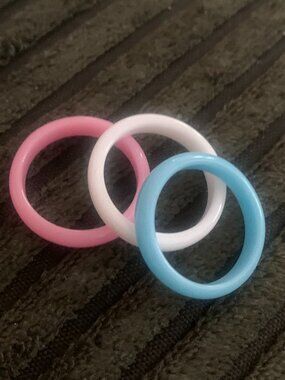 Set of Pink, Blue, and White Plastic Rings